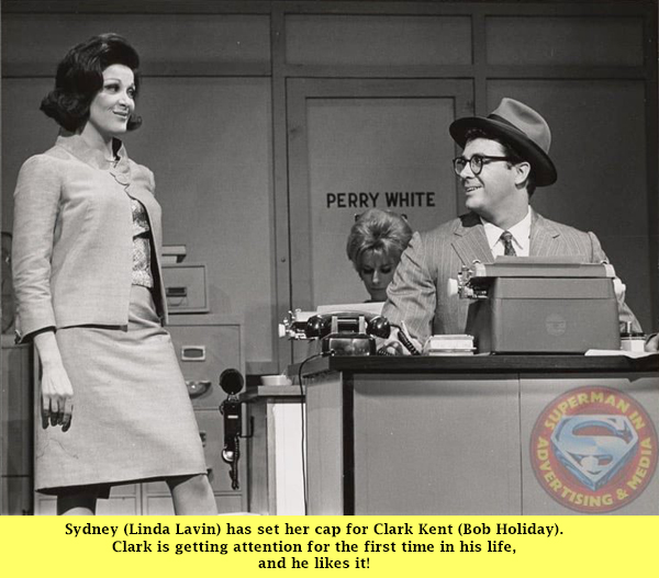 Sydney (Linda Lavin) Approaches Clark Kent's (Bob Holiday) Desk